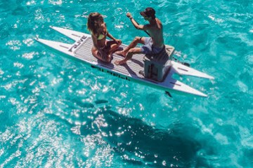 2 people on Catamaran Style Paddle Board