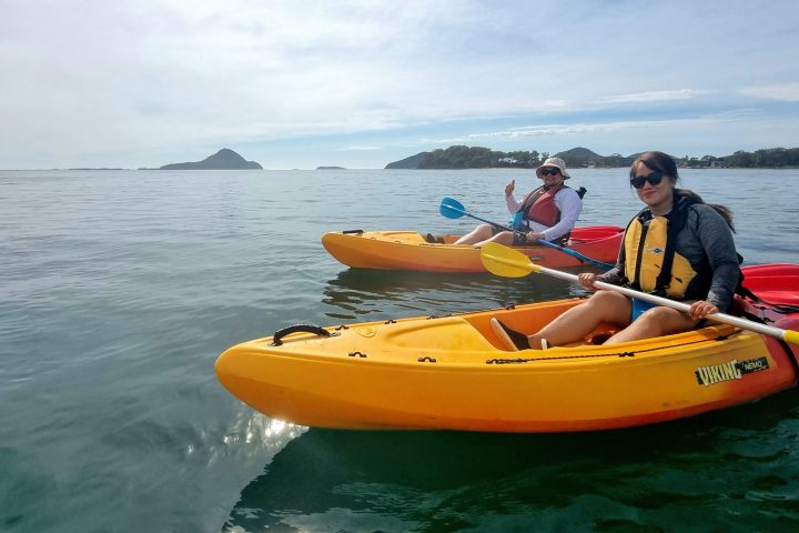 a small boat in a body of water